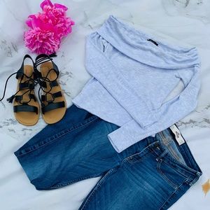 Light baby blue off the shoulder blouse.
